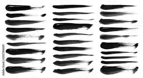 Collection of black ink brush strokes on white background