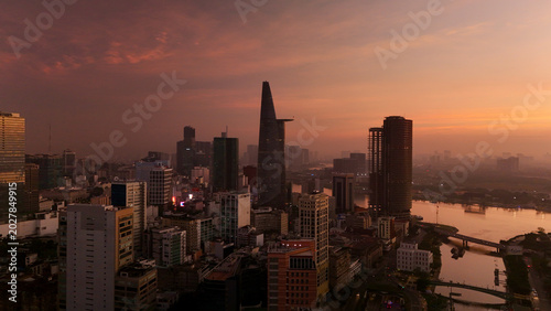 Принти на полотні Ho Chi Minh City, Vietnam – 4K aerial sunrise drone view of downtown skyline wit