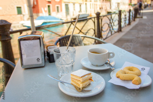 Coffee and pastries at a canal side cafe in Venice