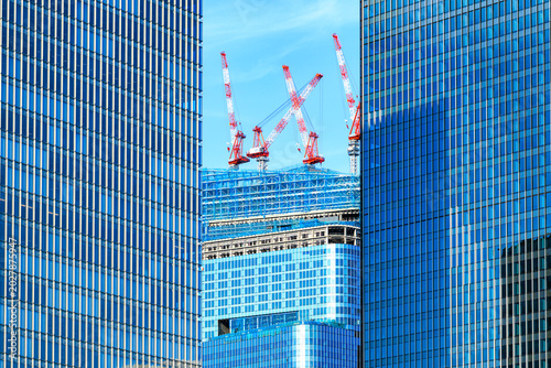 Futuristic urban development in Tokyo metropolis, symbolizing corporate growth and economic progress.