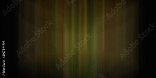 Fotografi Dark vertical motion blur background with gold and green lights appearing through shadows for mysterious cinematic stage effect