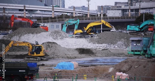Moving cranes at the under construction in Tokyo in winter