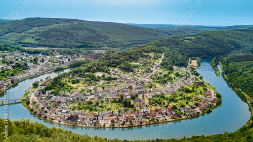 Photos Panoramic aerial drone view of green hills, french old village, Meuse river mean