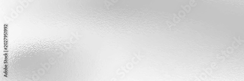 Photos Silver foil background with grainy texture