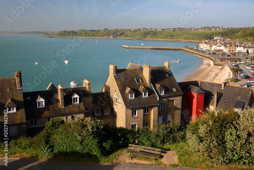 View towards the harbor of Cancale, Brittany, ile et vilaine, France, with traditional houses and roofs in the foreground