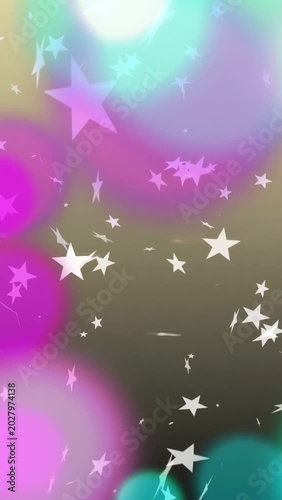 Vertical video: Bokeh fading and expanding, white star sprites growing and drifting, creating depth
