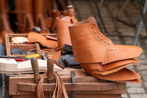 Shoemaker tools and leather materials The Concept of handmade shoes