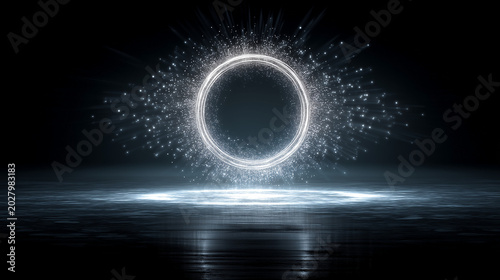 Shimmering silver ring of light floated in the darkness, with sparkling light emanating from a luminous sphere and reflecting onto a glossy black surface.