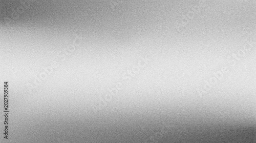Subtle silver gradient texture, a smooth metallic background with soft light reflections, elegant gray abstract surface, perfect for modern design and digital backdrops 4K grainy texture