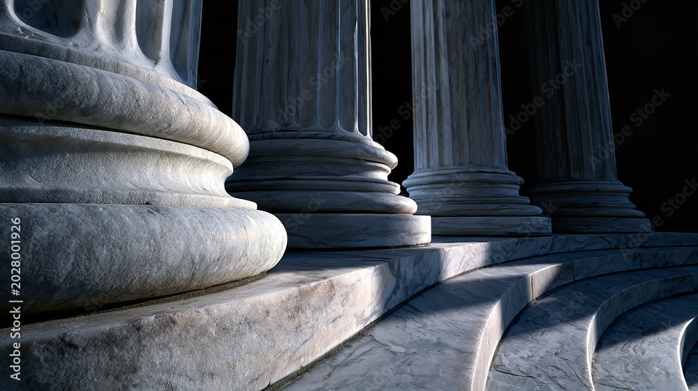 Naklejka premium Three elegant white marble columns rise above curved stone steps set against a stark black background under dramatic cinematic lighting that emphasizes architectural texture
