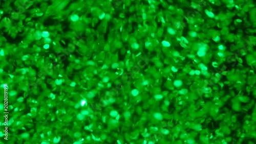 holographic Iridescent glitter particles background, showcasing a distinct shimmering texture with rainbow-colored light