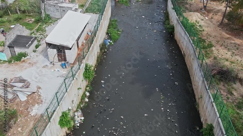 An Aerial View of Bangalore Canal overflowing foul smelling water and debris