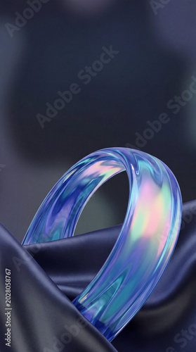Abstract Iridescent Glass Ring on Dark Silk Fabric