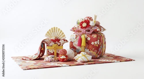 traditional japanese new year osechi ryori food and decorations on a floral mat