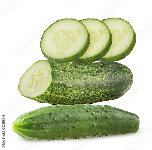 Fresh whole and sliced Cucumber one cut in half