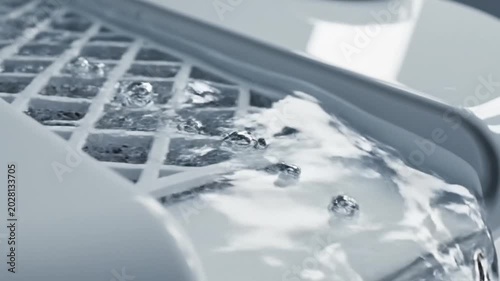 Abstract Water Flowing Through a Grid System, 4K Slow Motion, High Detail
