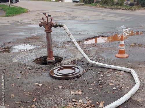 Obraz na plátně A fire standpipe installed on an underground hydrant to draw water from the water supply network