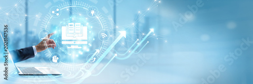 Businessman touching virtual interface with e-learning and digital remote education networking. Virtual classroom learning platform, interactive training, online skill development
