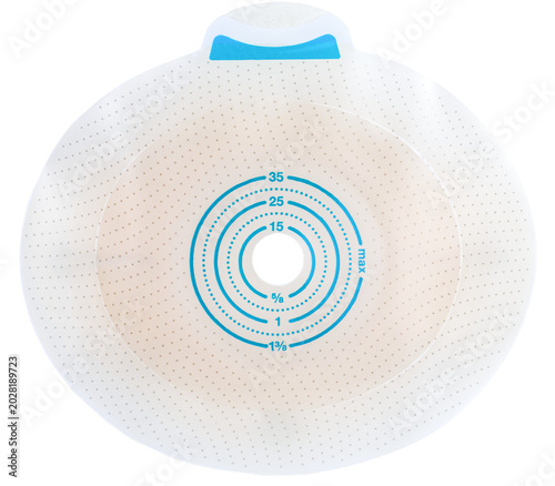 Stoma plate with blue measuring divisions for the required diameter,skin barrier for stoma care, medical accessory for people requiring care for urostomy, colostomy or ileostomy, isolated