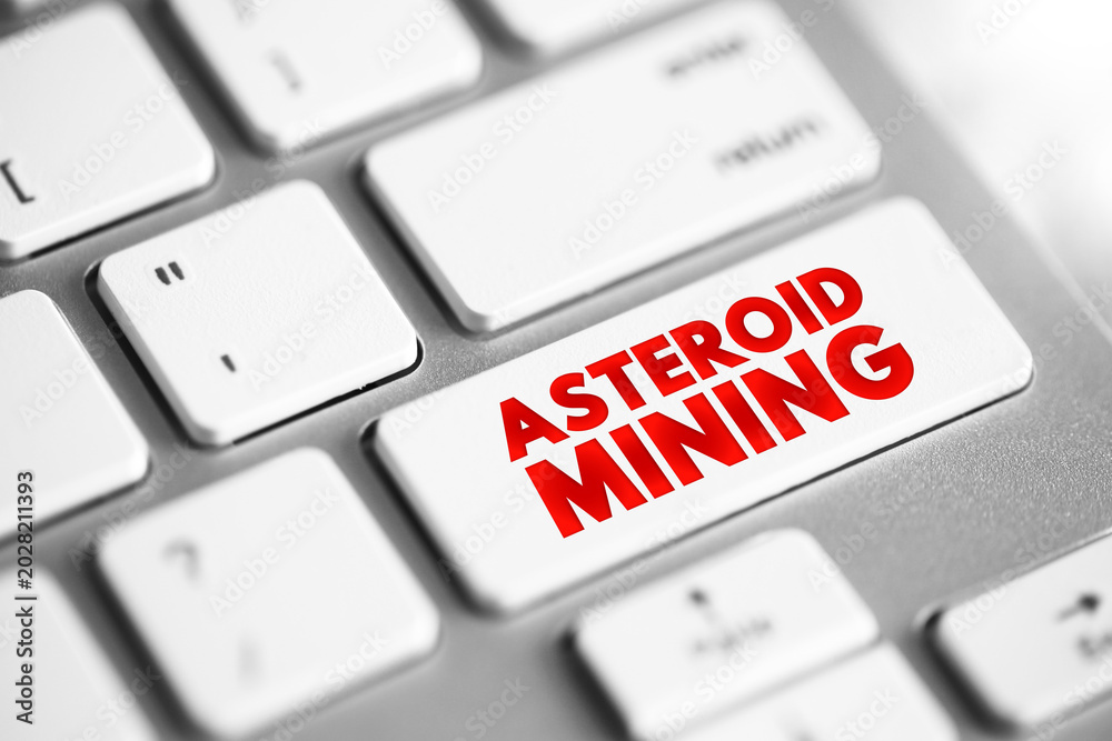 Fototapeta premium Asteroid Mining is the hypothetical exploitation of materials from asteroids and other minor planets, including near-Earth objects, text concept button on keyboard