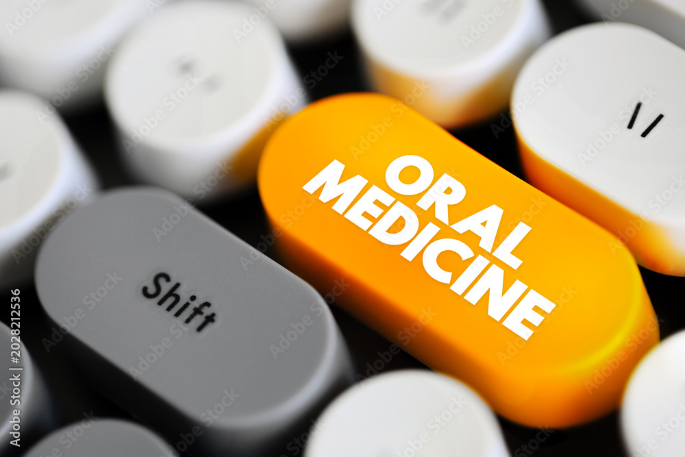 Fototapeta premium Oral Medicine - medical specialty dedicated to the prevention, diagnosis, and treatment of diseases of the mouth, text concept button on keyboard