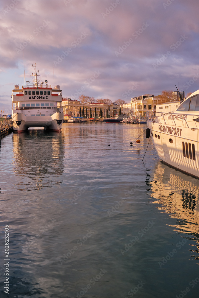Obraz premium Ships and boats in the harbor of Sochi sea port. Sochi. Krasnodar Krai, Russia