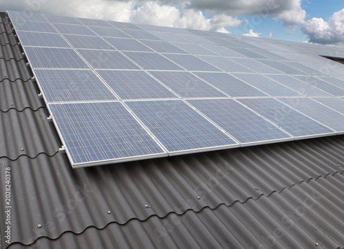 Solar panels at the roof of a stable of a farm
