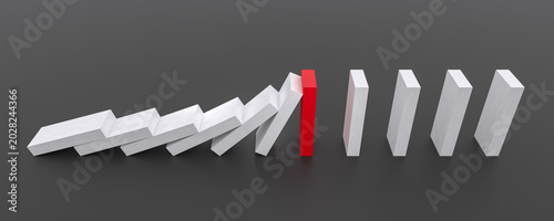 Cuadro en lienzo Crisis prevention with red domino block
