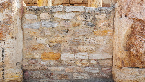 Fotografija Weathered Stone Wall Texture Background