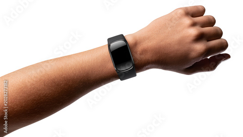 Fotografie Black fitness tracker on a person s wrist