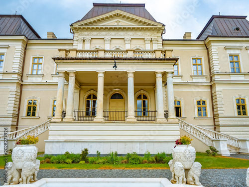 Rear facade of Banffy Castle in Rascruci, Cluj viewed from garden and fountain area