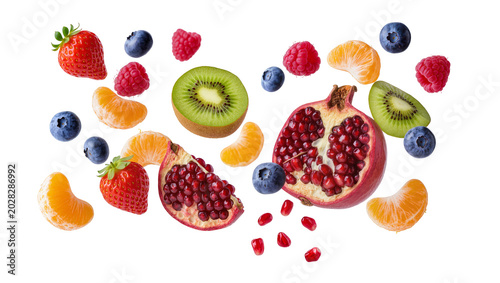 Quadro su tela Assorted fresh fruits strawberries blueberries raspberries kiwi tangerine slices