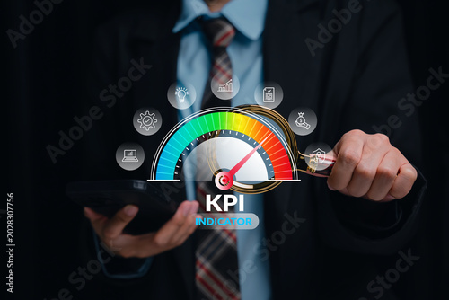 Quadro su tela Performance metrics dashboard, businesswoman holding smartphone with KPI gauge i