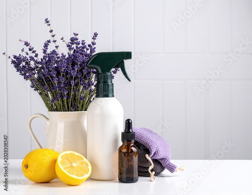 Refreshing lavender and lemon room spray bottle on a clean surface, evoking calm, citrusy aromatherapy and natural home fragrance