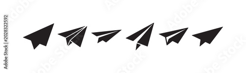 Collection of six solid black paper airplane silhouettes, featuring varied geometric styles and angles for modern communication and travel icons.