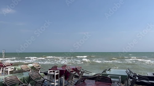 Rough sea waves at the restaurant