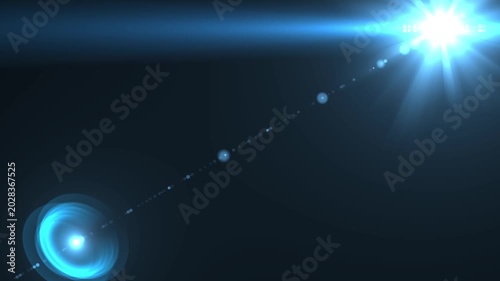 Bright blue lens flare transition with glow and scattered light dots effect, shine sparkle energy burst effect, shine sparkle energy burst on black screen background. 4k