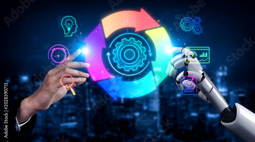 Tableau sur toile Hands of a human and a robotic arm interact with digital icons representing tech