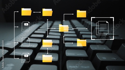 Fotografie Creative digital workspace concept with keyboard and document folders showcasing modern organization and data management in a virtual environment Gluon