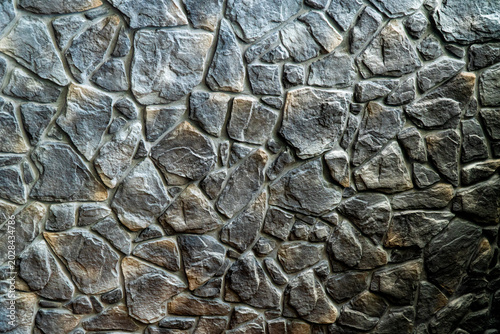 The wall surface, which is closed with granite, continuously arranged, beautiful with cement.