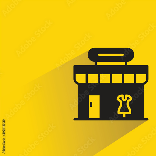 dress shop with shadow on yellow background
