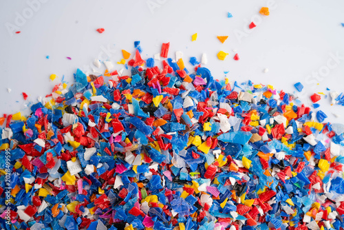 Tableau sur toile Plastic colorful pieces recycling shredded for industrial use.
