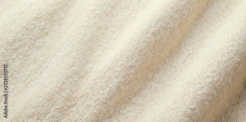 Close-up shot of textured natural linen fabric, exhibiting subtle variations in weave and color; ideal for design projects requiring rustic, organic background ,  rough,  canvas