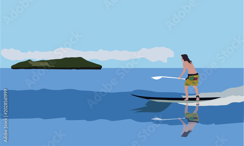 A surfer rides the ocean waves