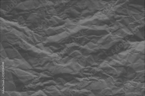 Fotografía The crumpled texture of a gray surface fills the entire frame.
