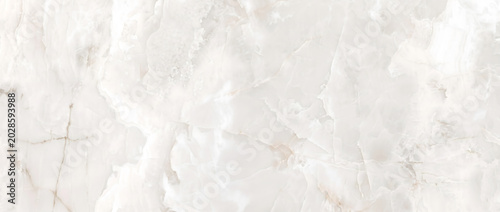 Quadro em tela Marble background shows a beautiful white onyx stone surface with warm natural c