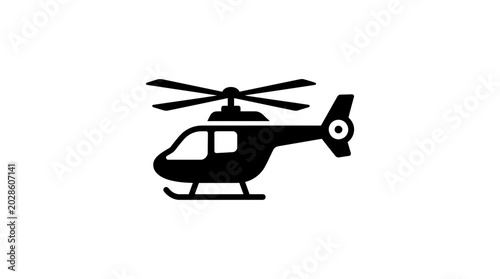 Foto Black helicopter silhouette flying high.