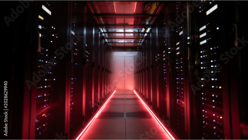 Photos Futuristic data center aisle with red light and fog atmosphere technology