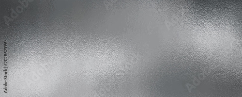 Foto Shiny silver foil metallic texture - glossy gray steel gleaming surface, frosted glass effect with blur glare reflection, bright polished metal material