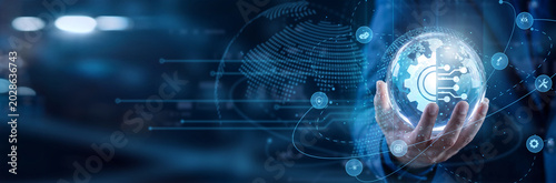 Фотография DevOps engineer hold circle in hand to optimize the industrial Automation network workflow